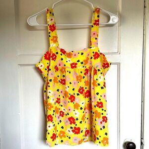 Bright‎ and cheerful yellow floral tank from Emily Wonder.
